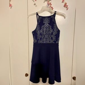 Beautiful short,dark blue dress, with tags.
